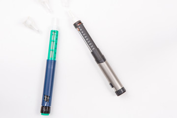 Insulin pen for diabetics on white background
