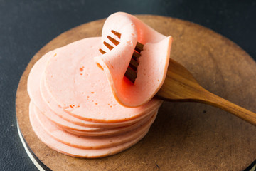 ham sausage or rolled bologna slices  © tanadach14