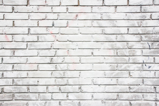 Grunge white brick wall background.