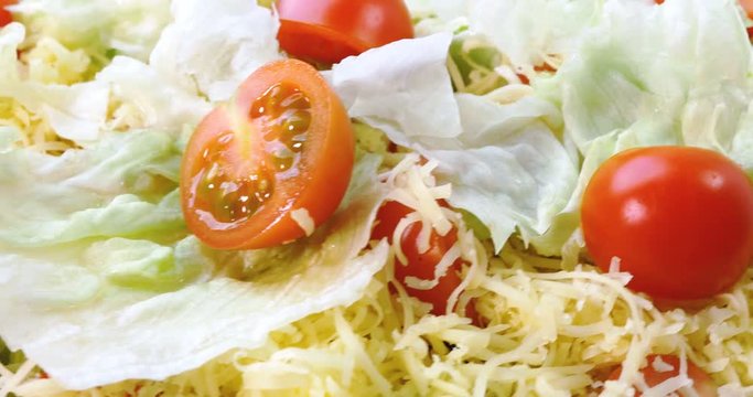 Beautiful colourful caesar salad with dressing croutons and parmesan cheese, healthy meal