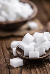 Old wooden table with white Sugar
