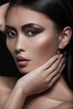 Closeup portrait of asian model with fashion evening  shining makeup