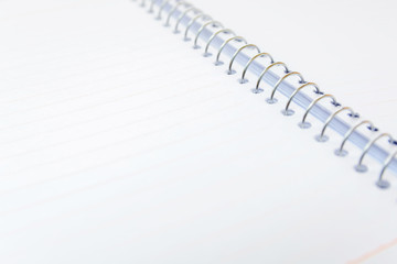 notebook with a metal spring and blank pages