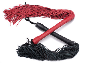 Red sex leather whip on white background