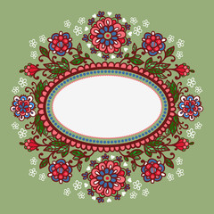 Oval frame with flowers.