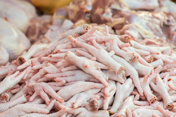 Chickens feet put it on the market for sale.