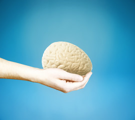 Hand with brain blue