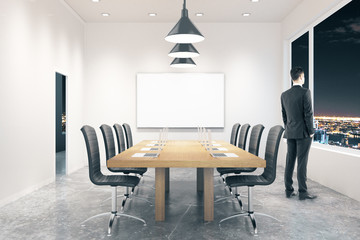 Conference room with businessman night