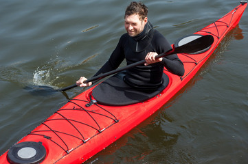 sports cheerful man in red kayak03