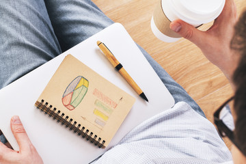 Man drawing business chart