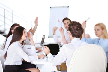 Fototapeta premium Young colleagues sitting at the business meeting in the office