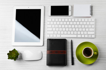 Business desk with equipment, flat lay