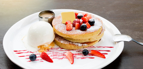 strawberry pancake on white plate