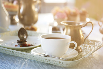 Obraz na płótnie Canvas Delicious tea and cakes on wooden table, closeup