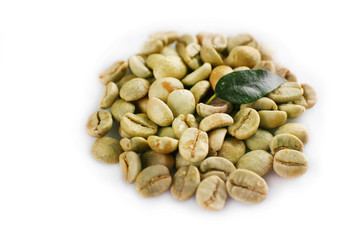 Green coffee beans on white background