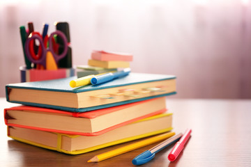 Dairies with stickers and organizer on wooden table