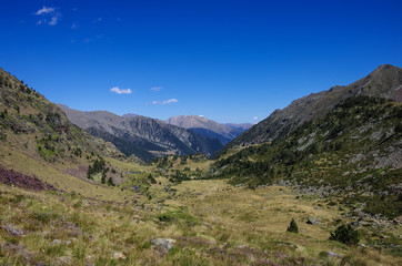Panorama of the Pyrenees mountains in Andorra, from top of Coma Pedrosa peak.