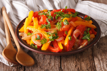 Hot pepper salad with tomato and onion close-up. horizontal
