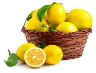 Lemons in basket isolated on white