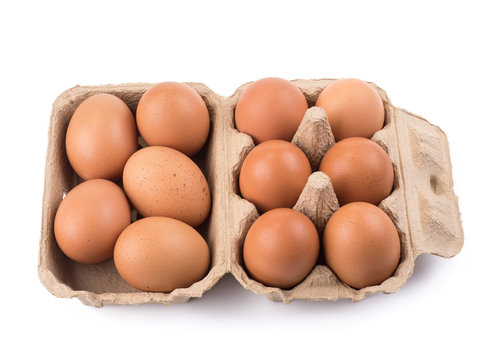 brown eggs on paper tray isolated