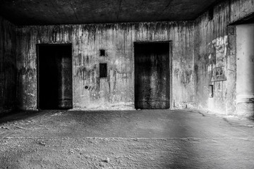 Fototapeta na wymiar Abandoned building ghost living place with two doors