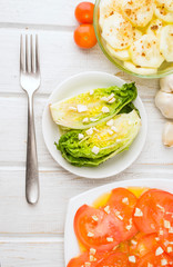 Overhead view Oiled heart lettuce and garlic