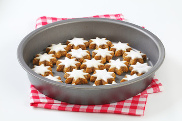 Cinnamon star cookies glazed with frosting