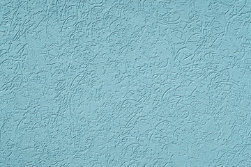 Hintergrund in hellblau oder türkis. Wand gestrichen.