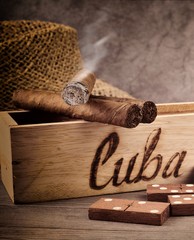 Smoking cigar and domino game, Cuba. © unverdorbenjr