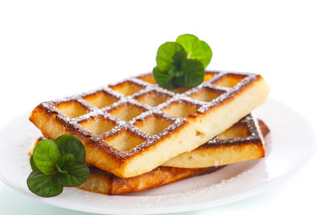baked cheese waffles with powdered sugar