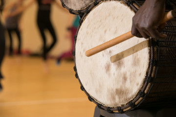 African man playing drum