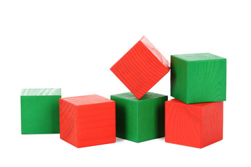 Colorful wooden toy cubes isolated on a white
