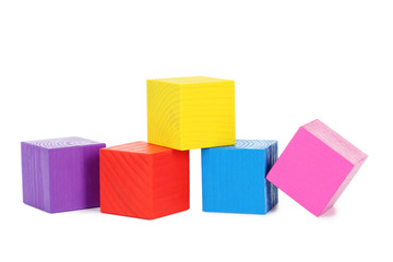 Colorful wooden toy cubes isolated on a white