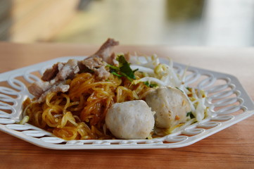 rice noodle filling boiled pork and bean sprout on dish