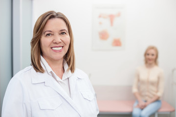 Fototapeta premium Skillful general practitioner is serving the lady