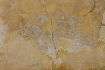 concrete wall with old plaster chipped texture background