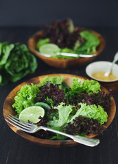 Green healthy lettuce salad with lime.