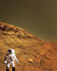 Astronaut spaceman planet Mars surface martian colony space landscape. Elements of this image...