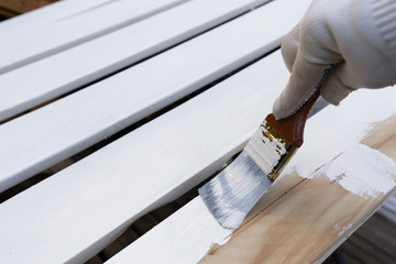 Painting timber boards with white paint