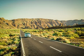 Zelfklevend Fotobehang Volcanic Landscape with car at Teide at Tenerife, Canary Islands © Neissl