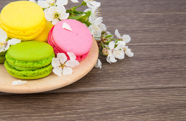 Macaroon on wooden & flowers