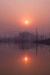 Red sunset over river