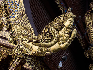 Fototapeta na wymiar Angel at Wat Pra Sing, Chiang Rai, Thailand,