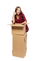Young woman with cardboard boxes