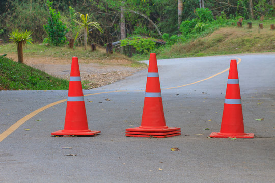 traffic warning cone on road