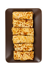 Russian Stuffed Blintzes Isolated on White. Selective focus.