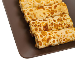 Russian Stuffed Blintzes Isolated on White. Selective focus.