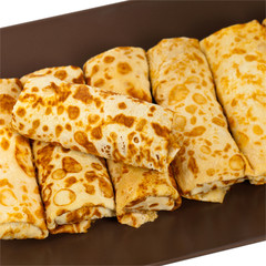 Russian Stuffed Blintzes Isolated on White. Selective focus.