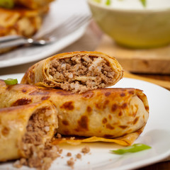 Blintzes or Russian Pancakes with Meat. Selective focus.