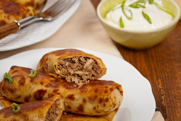 Blintzes or Russian Pancakes with Meat. Selective focus.